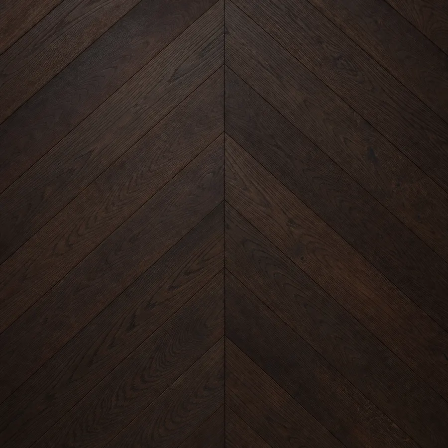 Dark smoked espresso oak flooring laid in a chevron pattern